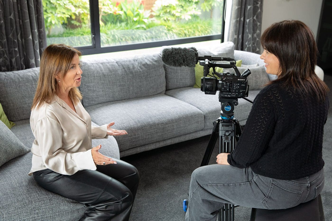 Niki filming a short feature film with a client, telling their story.